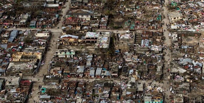 Haiti tries to get hurricane aid right, but cholera blamed on U.N. weighs